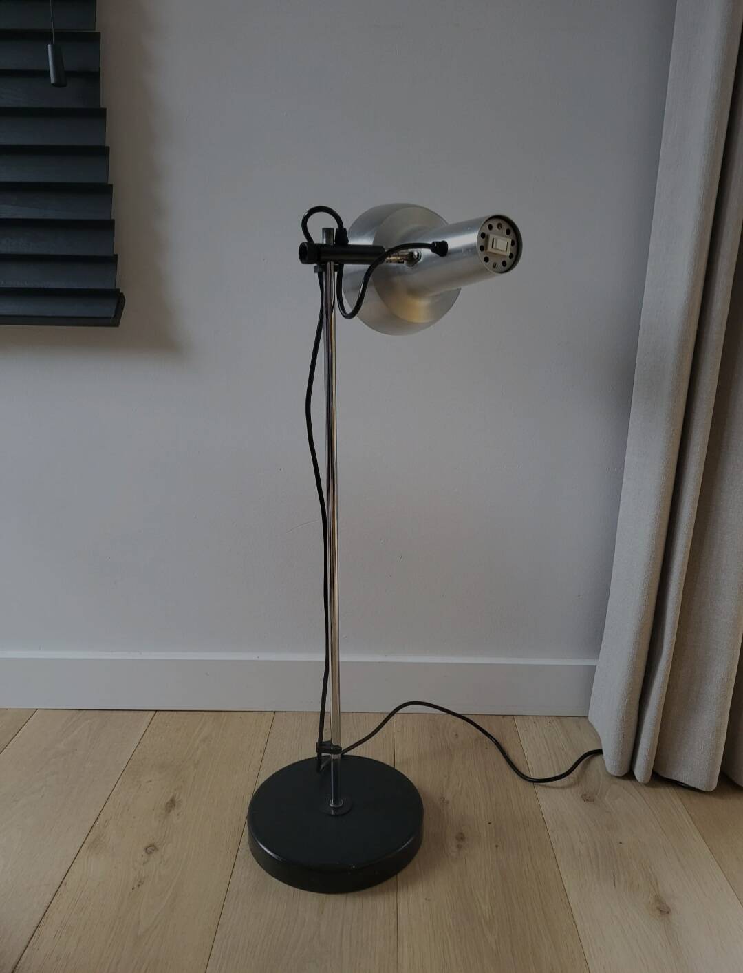 Vintage floor lamp from the mid-century, chrome, presumably 1970s.