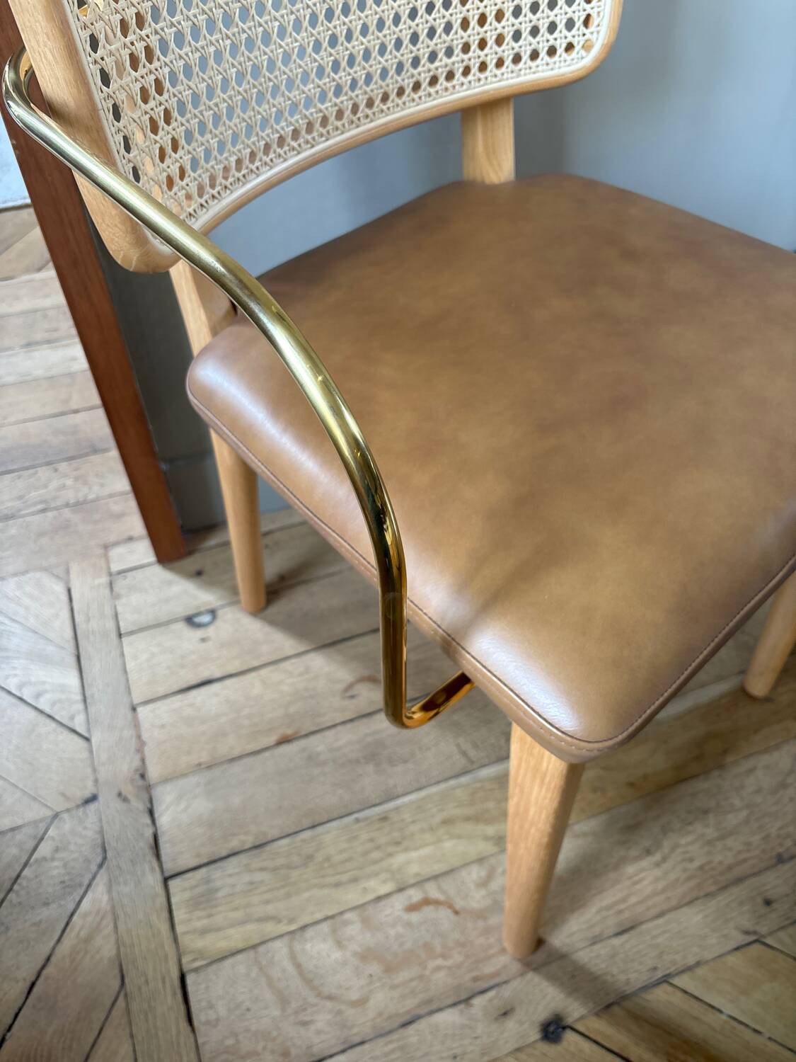 Red Edition cane chair in tobacco leather