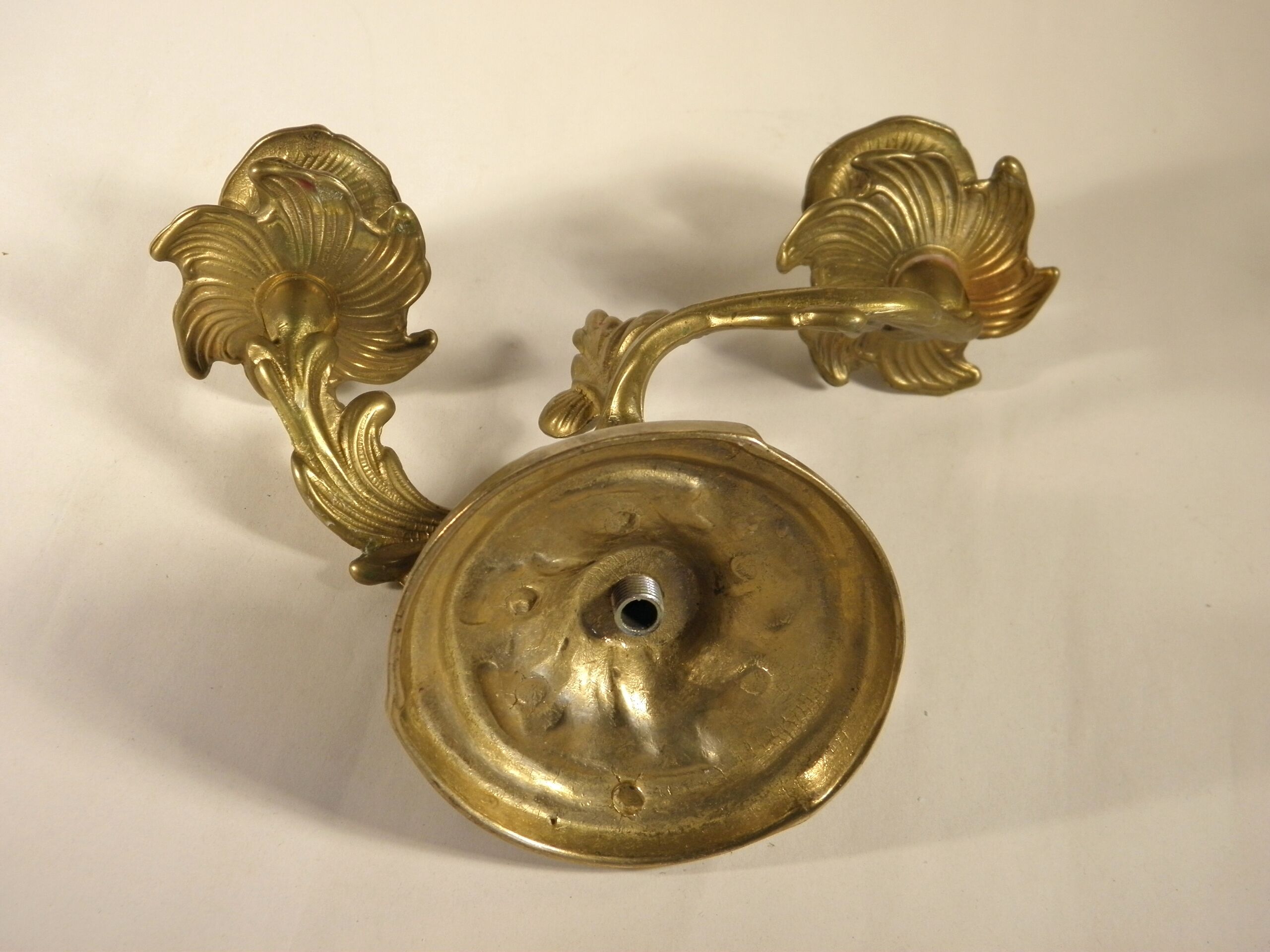 Two-branched candlestick in gilded bronze