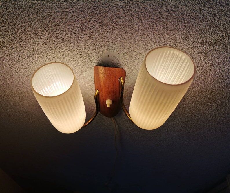 Teak wall lamp for the 70s