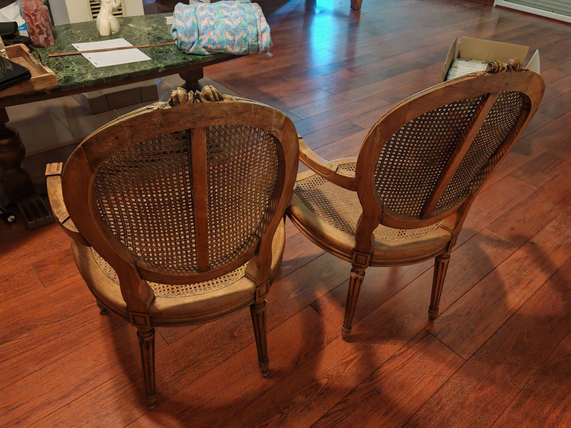 Caned armchairs
