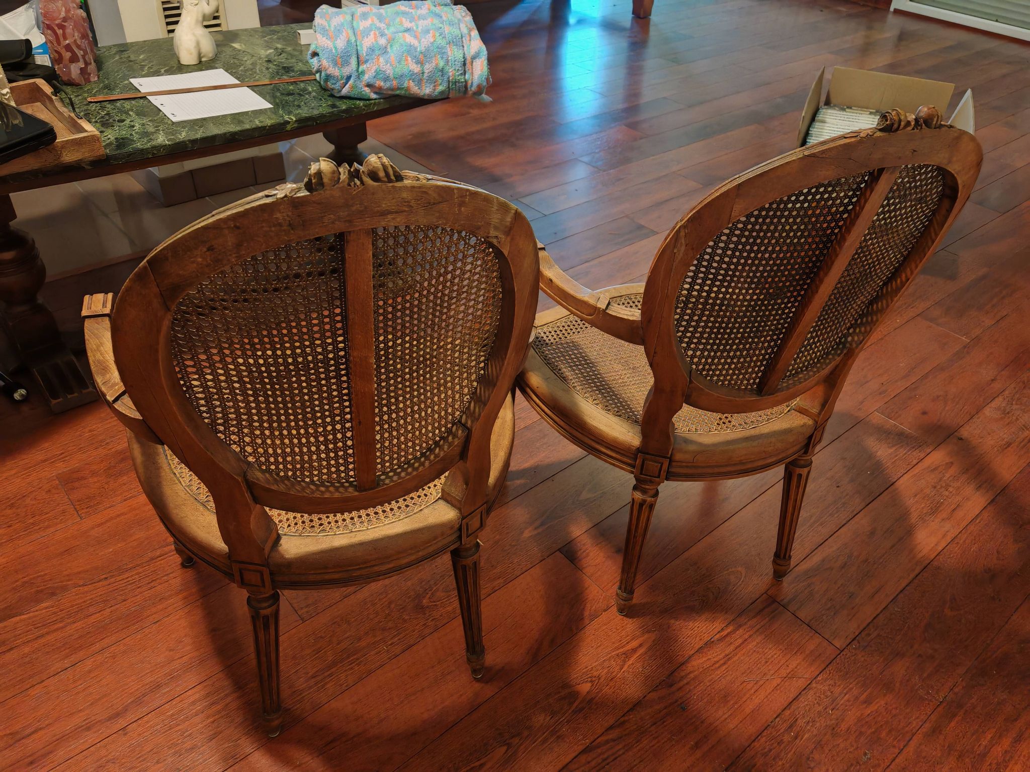 Caned armchairs