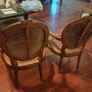 Caned armchairs