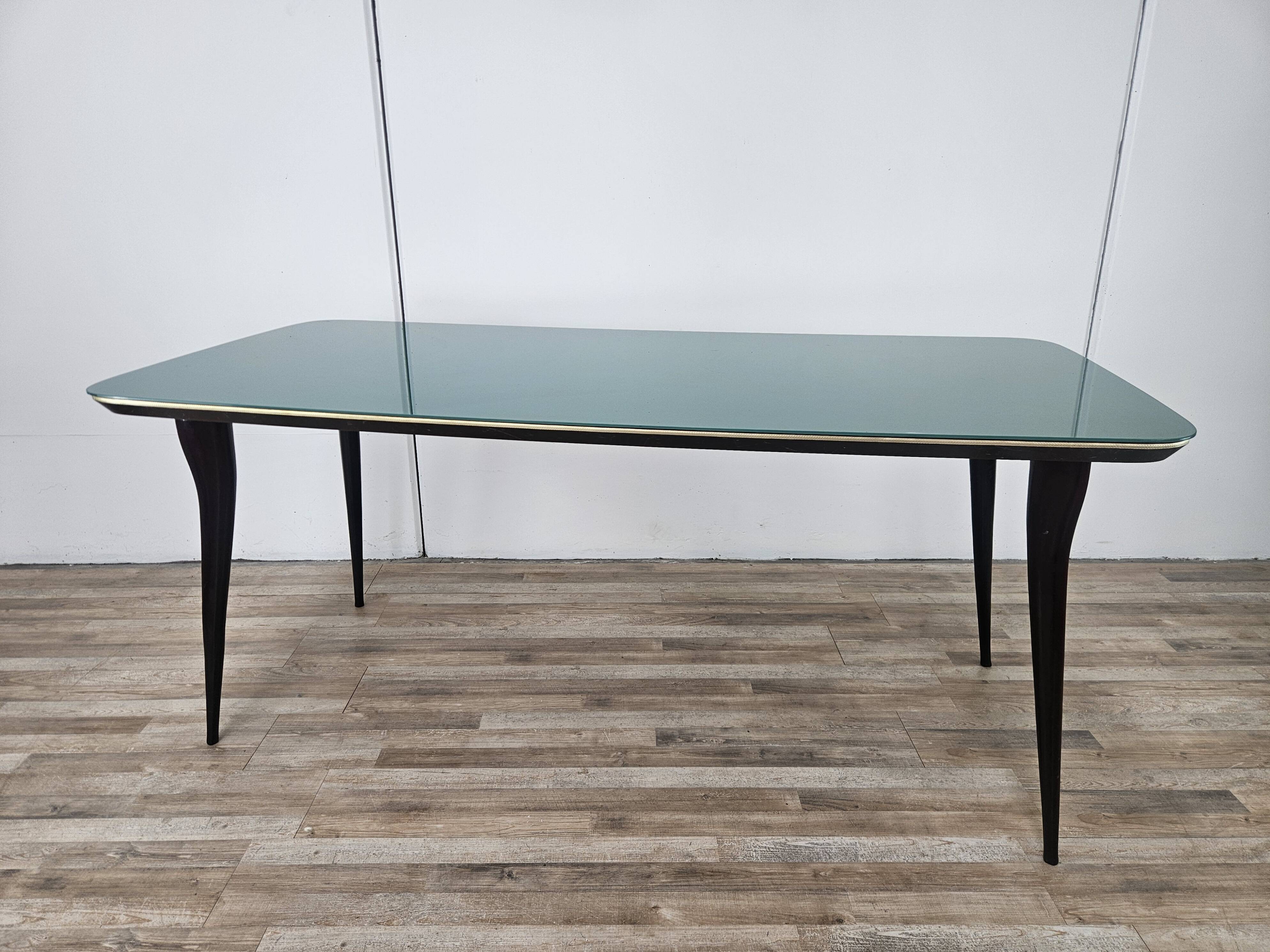 Mid-century mahogany dining table with aquamarine glass top