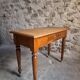 Vintage beech desk with a linoleum top and drawer.
