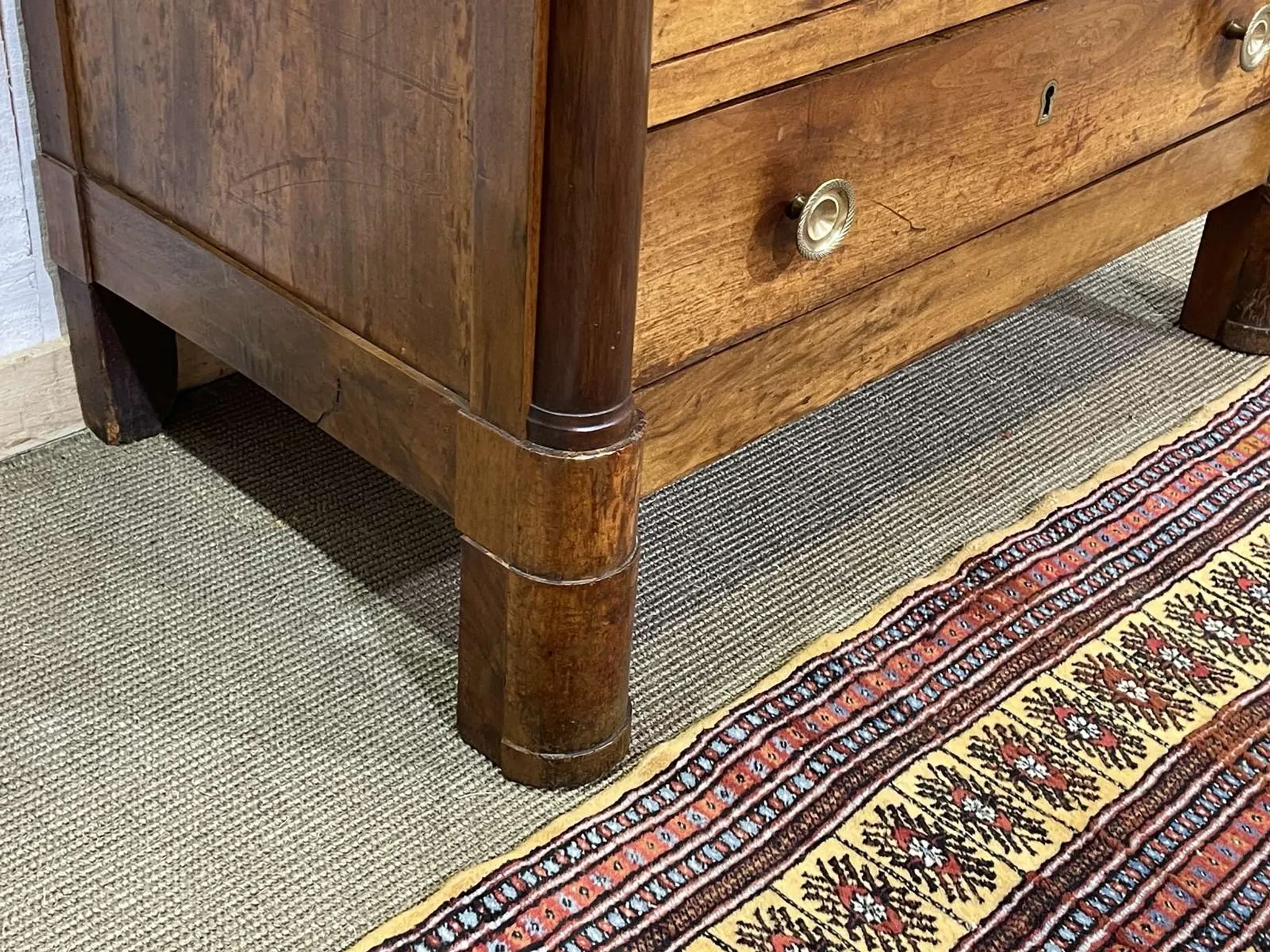 19th-century Empire commode in walnut with a grey St Anne marble top.