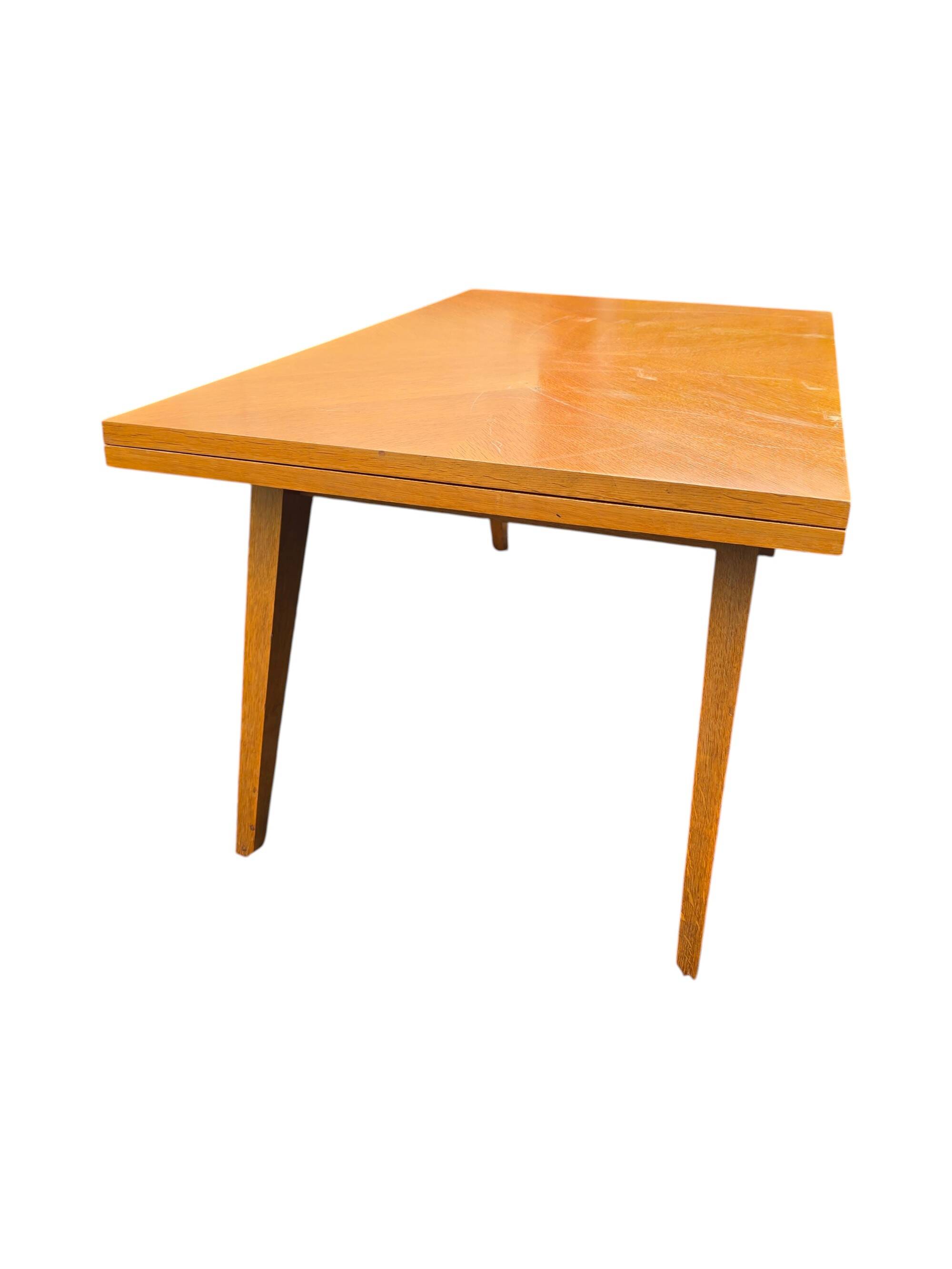 Scandinavian 1960s transformable coffee table in light wood.