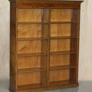 Pair of Sheraton Revival bookcases in satinwood, walnut, and yew.