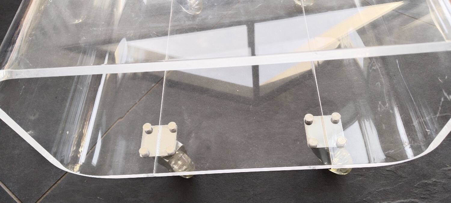 Plexiglas coffee table on wheels