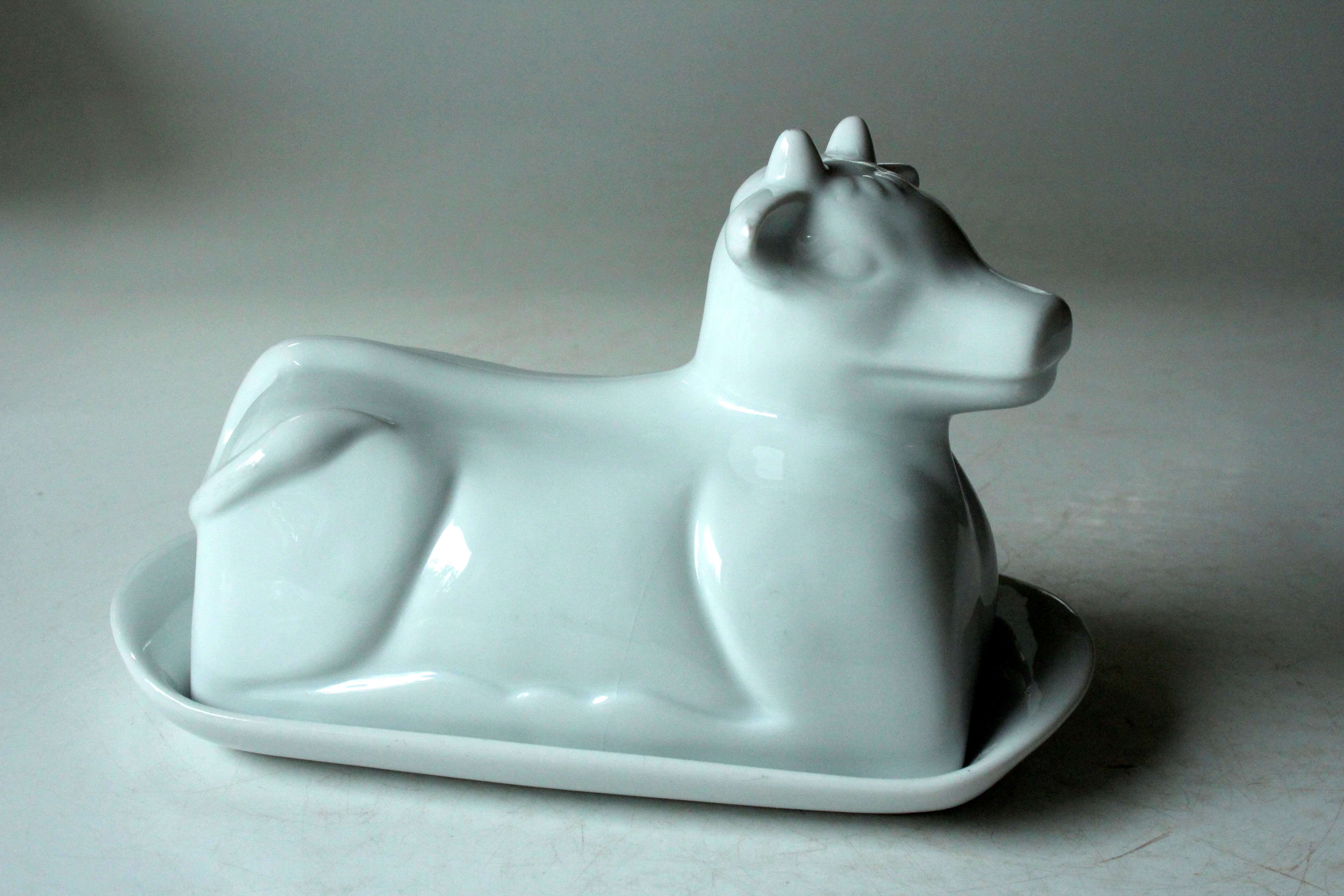 White ceramic butter dish in the shape of a cow, vintage