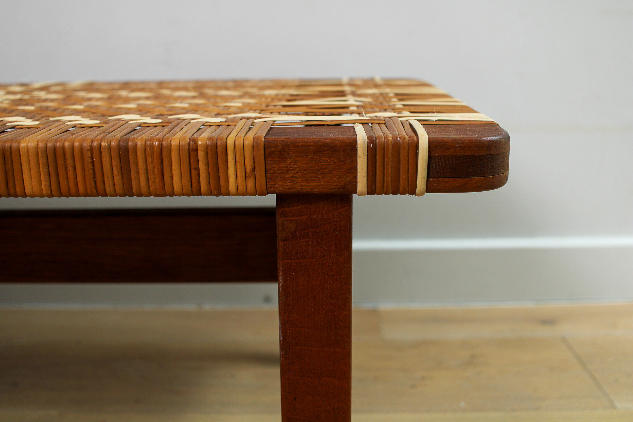 A vintage mid-century Danish Borge Mogensen 5272 rattan coffee table/bench