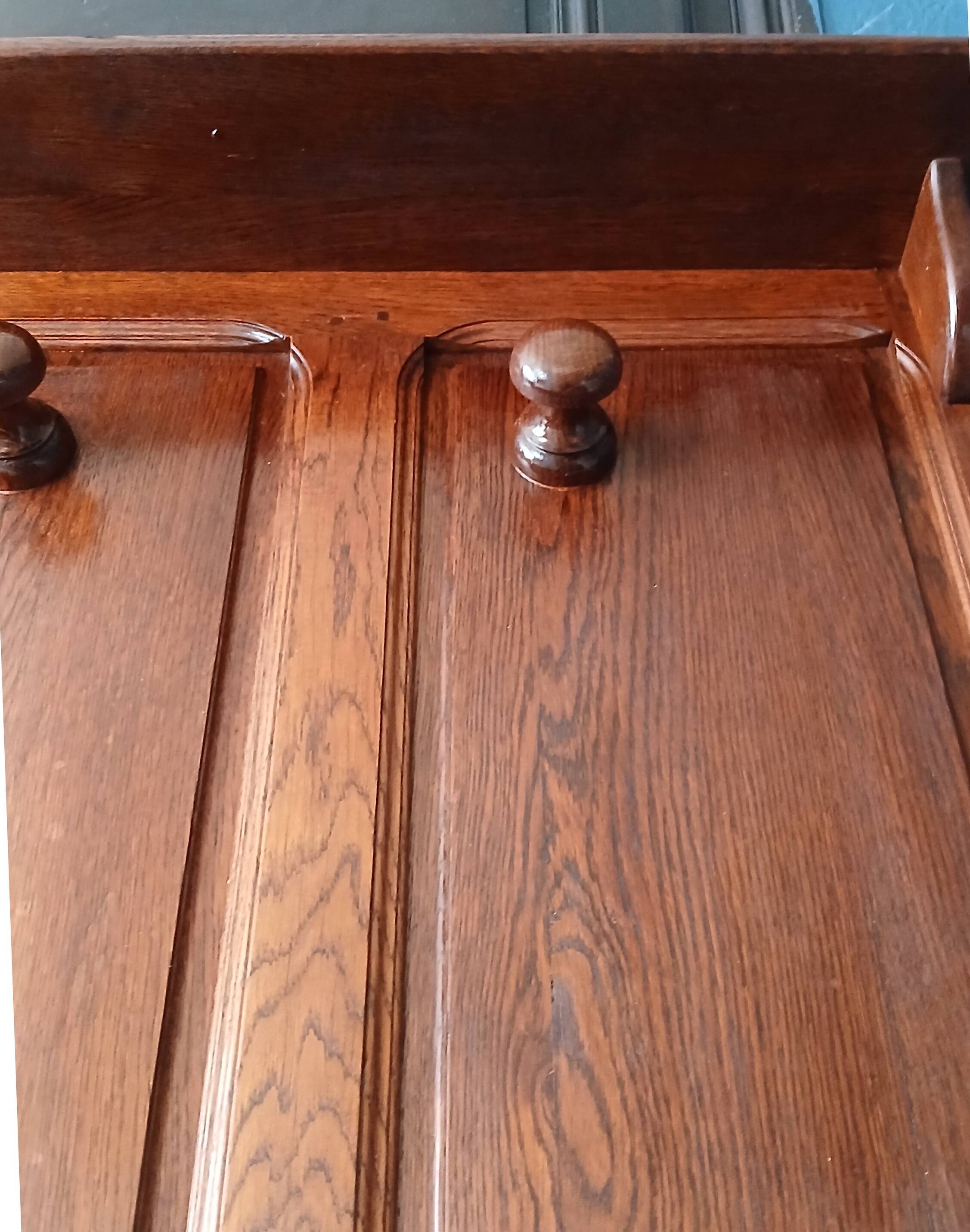Entrance hall wardrobe in solid oak, pegged, circa 1940.