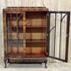 English Chippendale walnut display cabinet from the 1930s