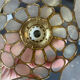 Pair of portable lamps with mother-of-pearl lampshades and brass.