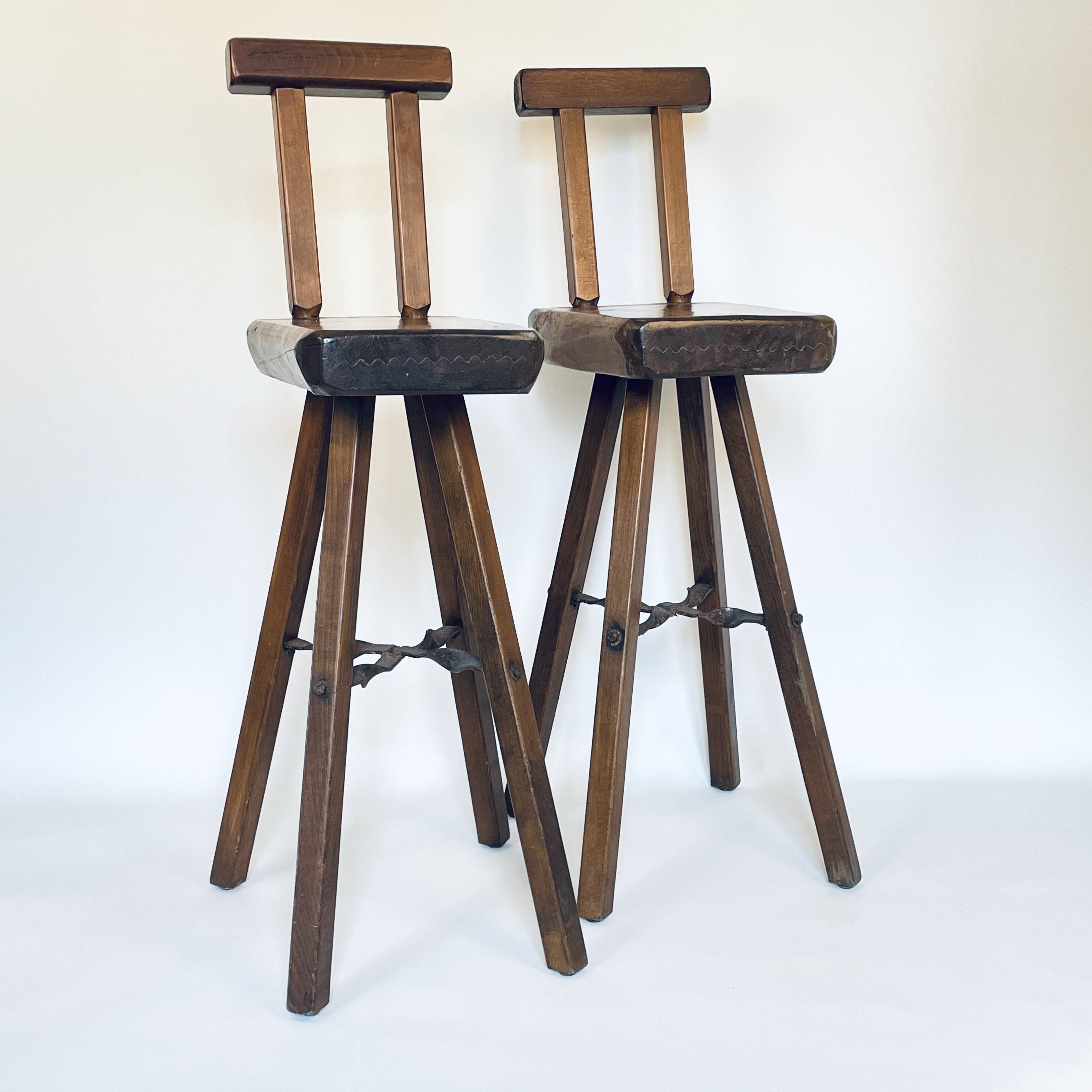 Pair of brutalist bar stools published by Mobichalet, 1950