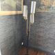 Lampadaire en métal noir et doré 1960