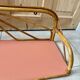 1960s rattan shelf with terracotta top