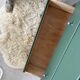 Vintage olive green chest of drawers with striped base