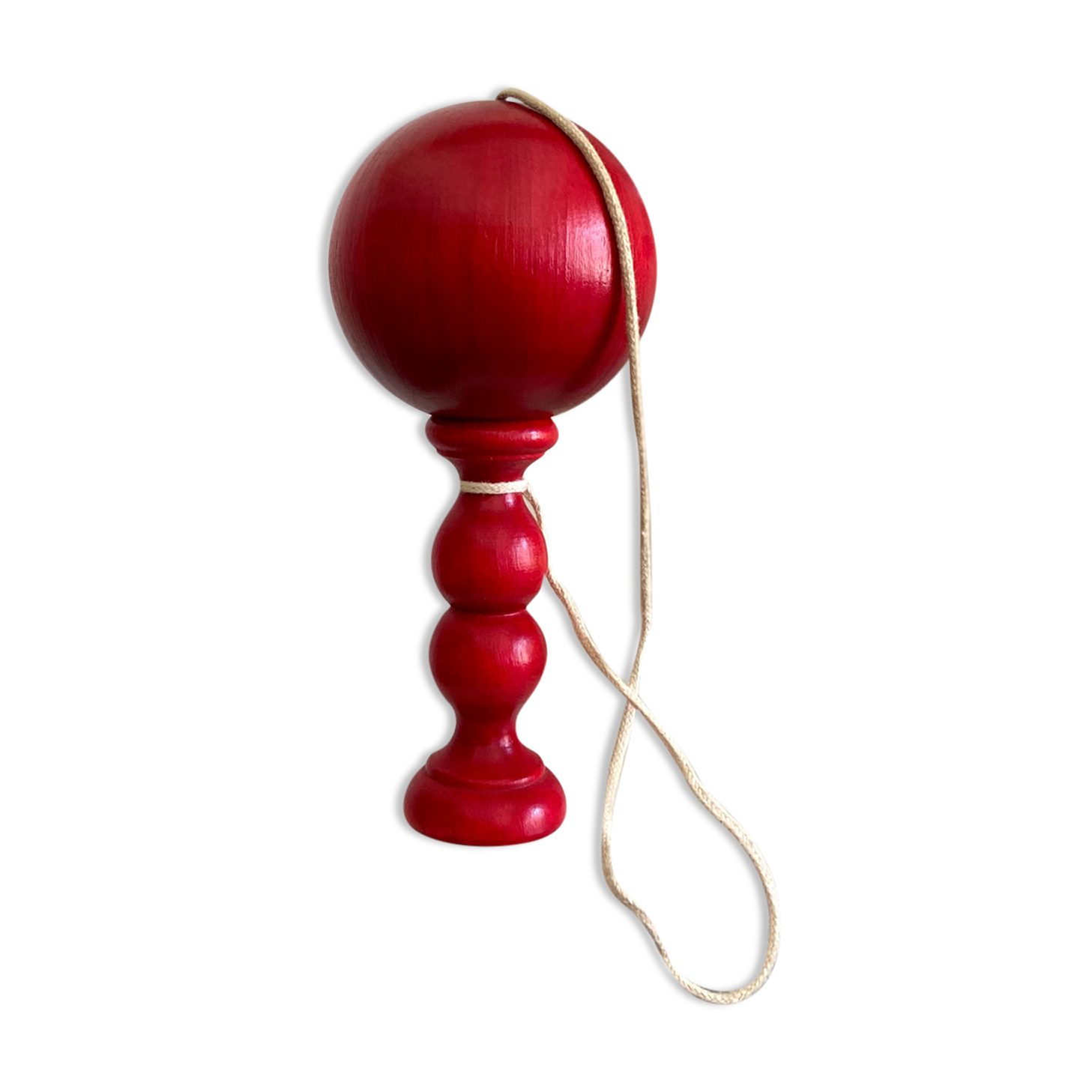 Bilboquet in red wood