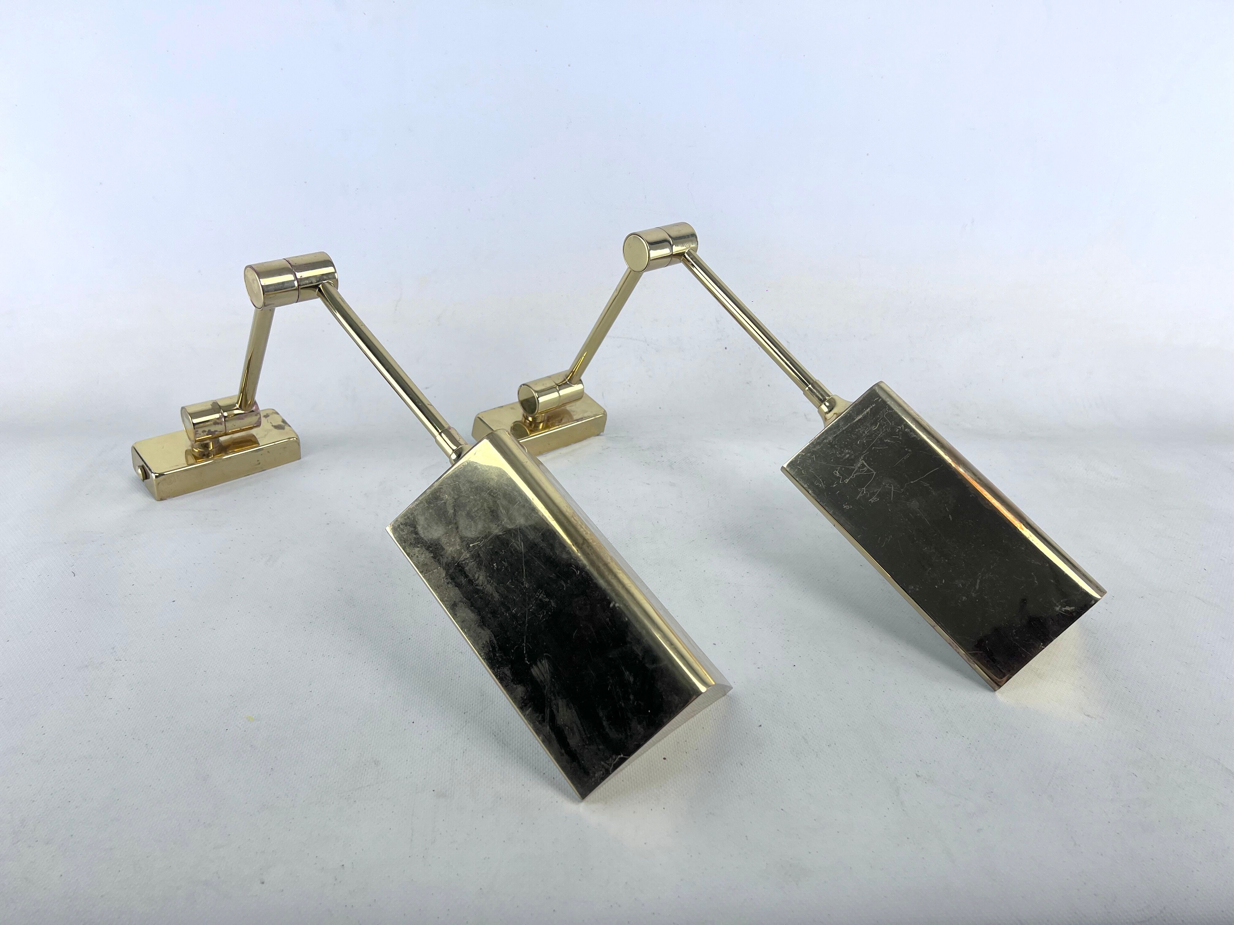 Postmodern pair of articulated brass wall lamps by Baulmann Leuchten. Germany 1980s