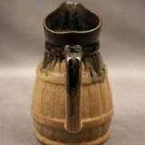 Barrel pitcher in beige enameled stoneware