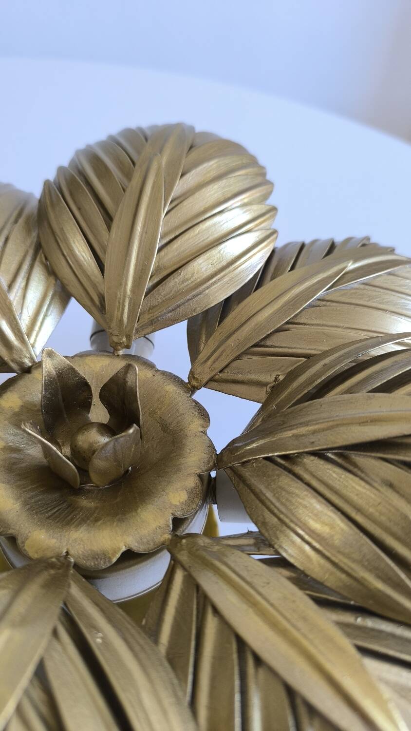 Gold metal flower wall light