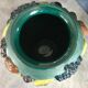 Green ceramic vase with polychrome decoration of fruits and vegetables in relief 33.5 cm