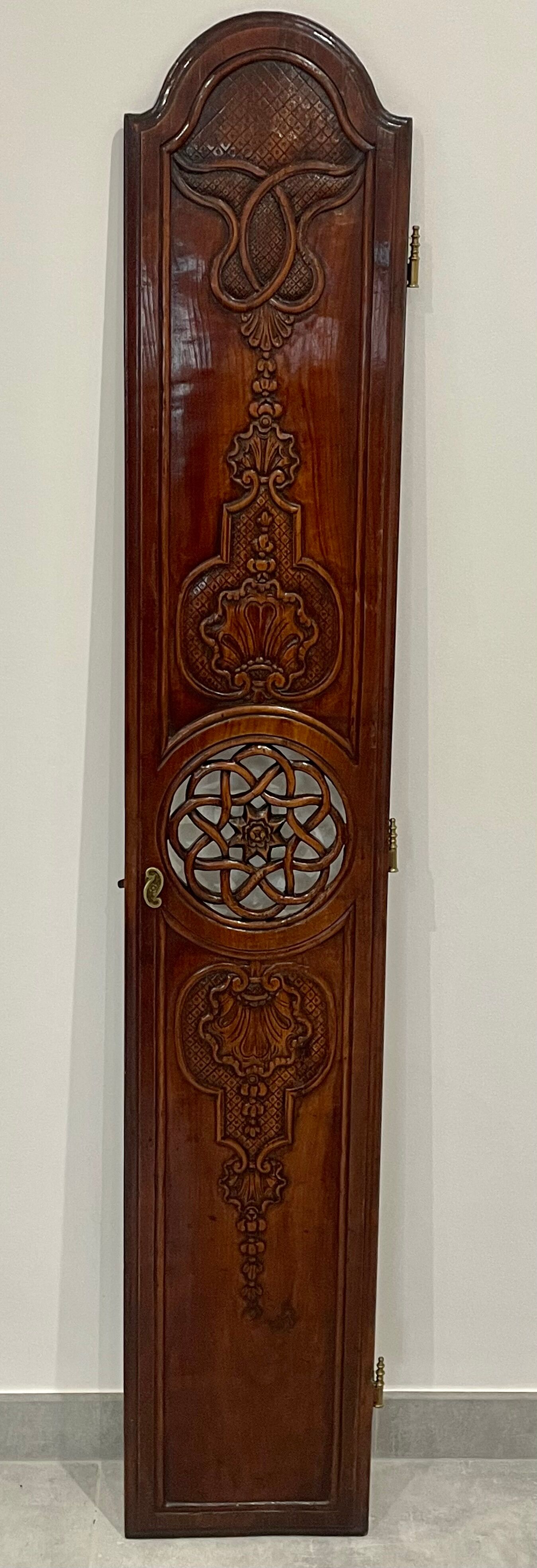 Clock door carved and openwork wood