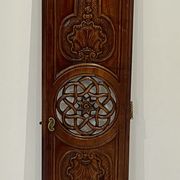 Clock door carved and openwork wood