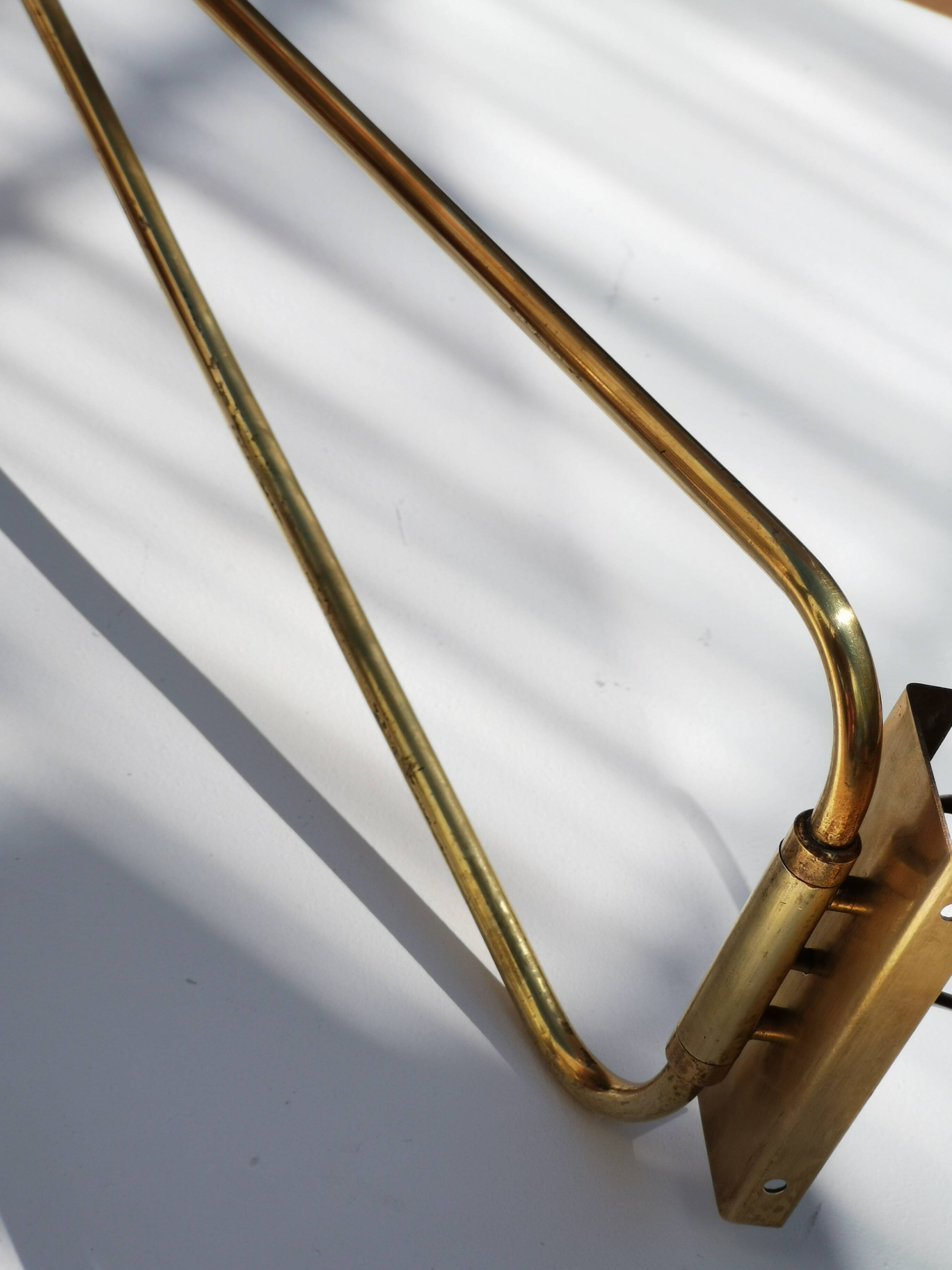 Large Diabolo wall lamp René Mathieu for Lunel burgundy color