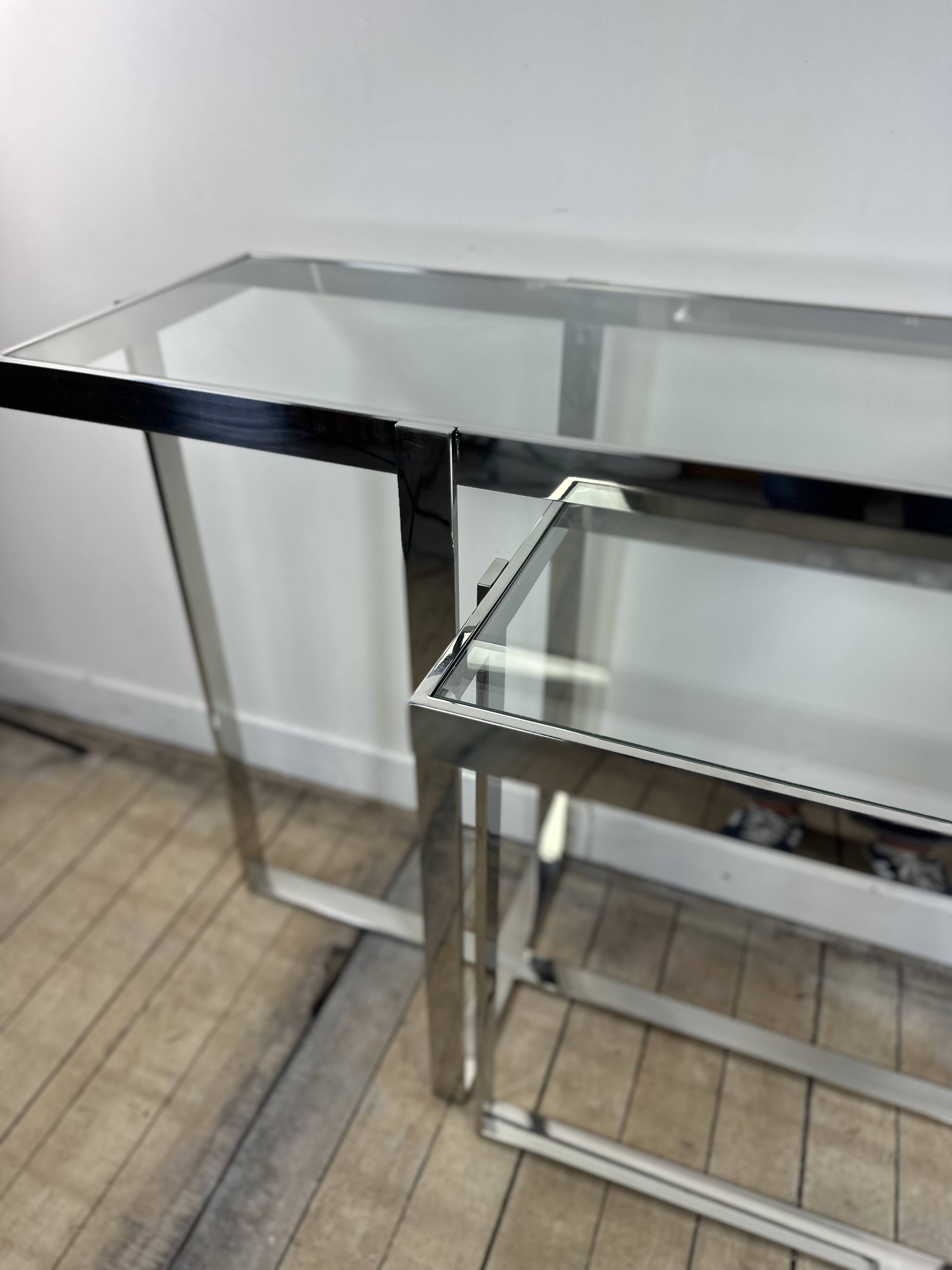 Chrome metal and glass console from the 2000s.