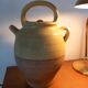 Terracotta goat water jug