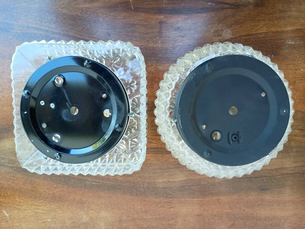 Pair of 1970s molded glass ceiling or wall light globes