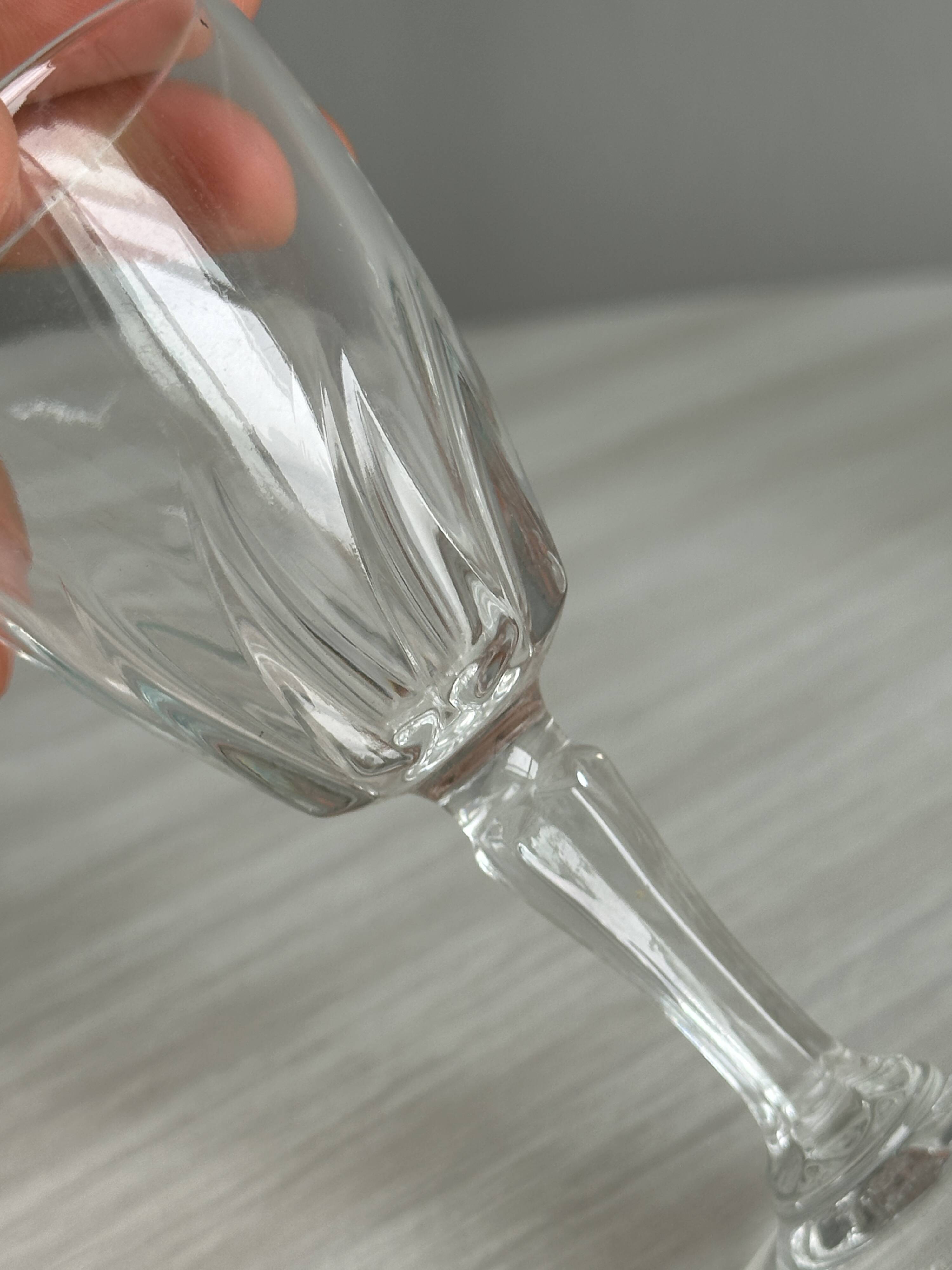 5 clear crystal liqueur glasses.