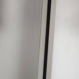 Table de Luigi Saccardo pour Maison Jansen acier brossé verre noir 1970