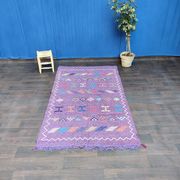 Moroccan purple ethnic carpet