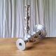 Pair of antique chrome metal candlesticks