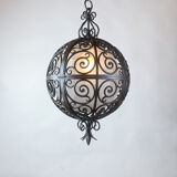 Suspension ronde en fer forgé avec sphère intérieure en verre, c.1930