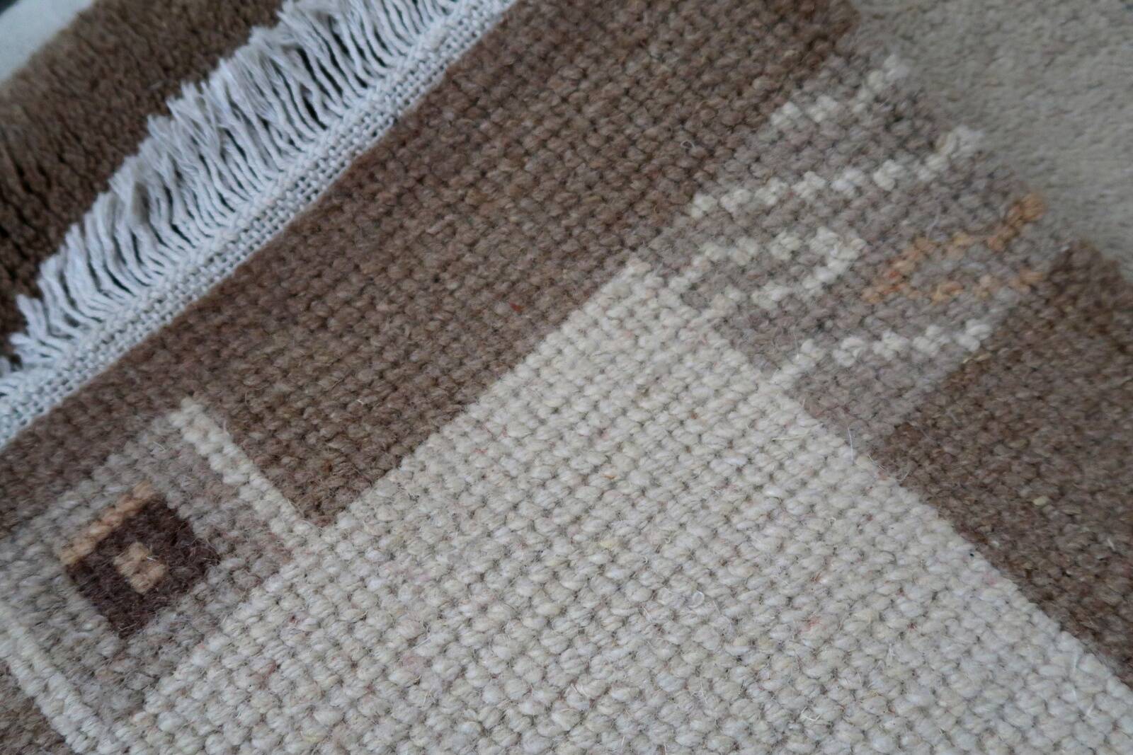 Tapis vintage tibétain Khaden fait main en laine – 64 x 124 cm  Années 1970