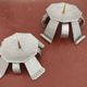 Pair of brutalist hammered aluminium candlesticks, 1970s