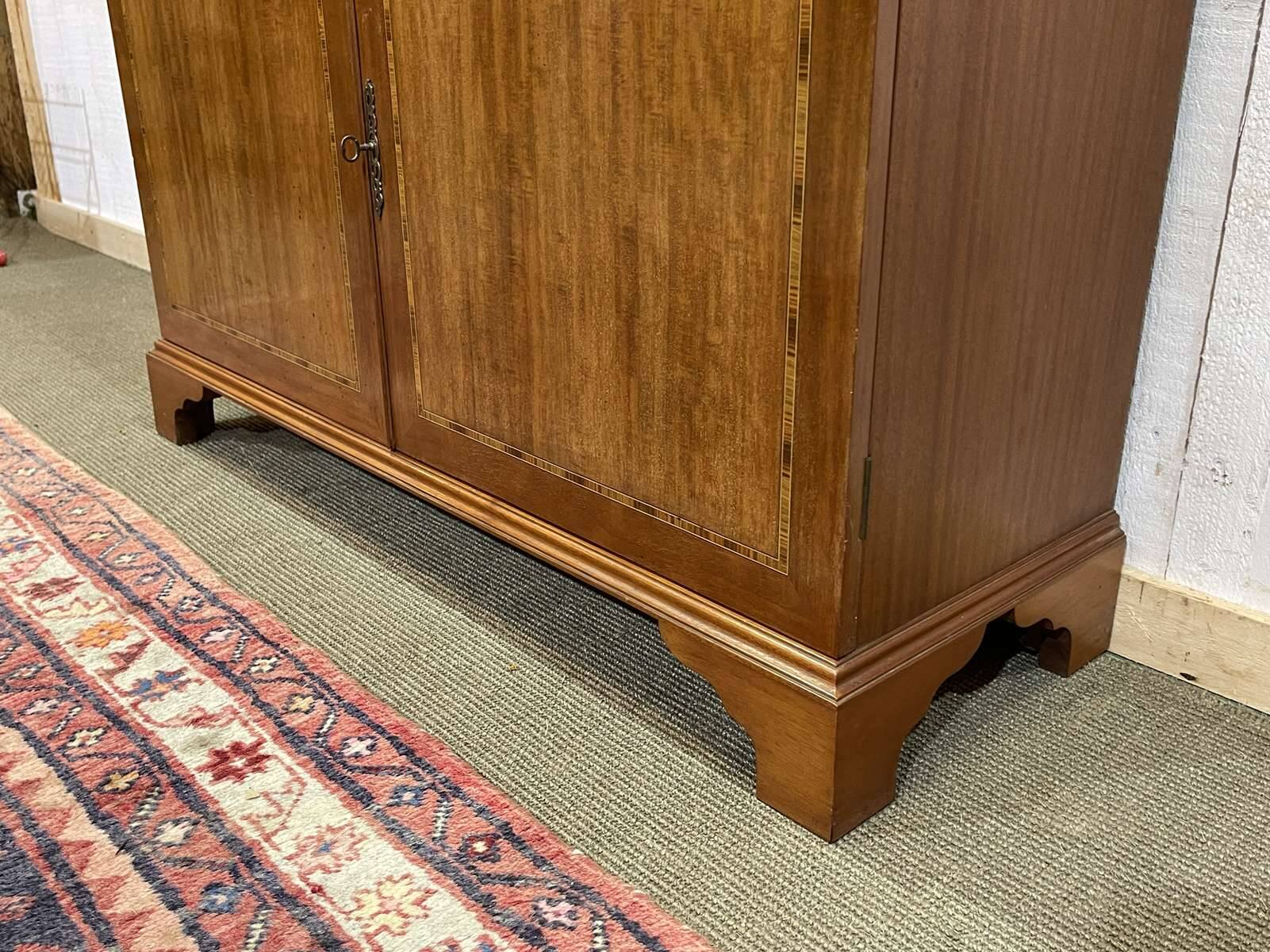 English two-piece mahogany bookcase from the 1950s