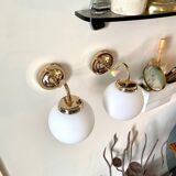 2 wall lamps in gilded metal and white opaline
