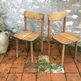 A pair of Chair grain of Café Pierre Gautier - Delaye