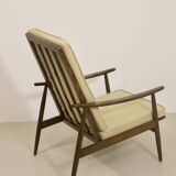 Scandinavian armchair 1960 curved armrests.