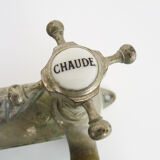 Old bathtub faucet, kitchen in silvered bronze with its shell-shaped soap dish