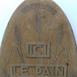 Bakery wood panel "here bread is baked over a wood fire"