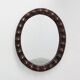Spanish Brutalist Oval Mirror in Hand-Carved Wood with Brass Studs