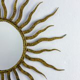 French sunburst starburst mirror in gilt iron, 1950s