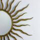 French sunburst starburst mirror in gilt iron, 1950s