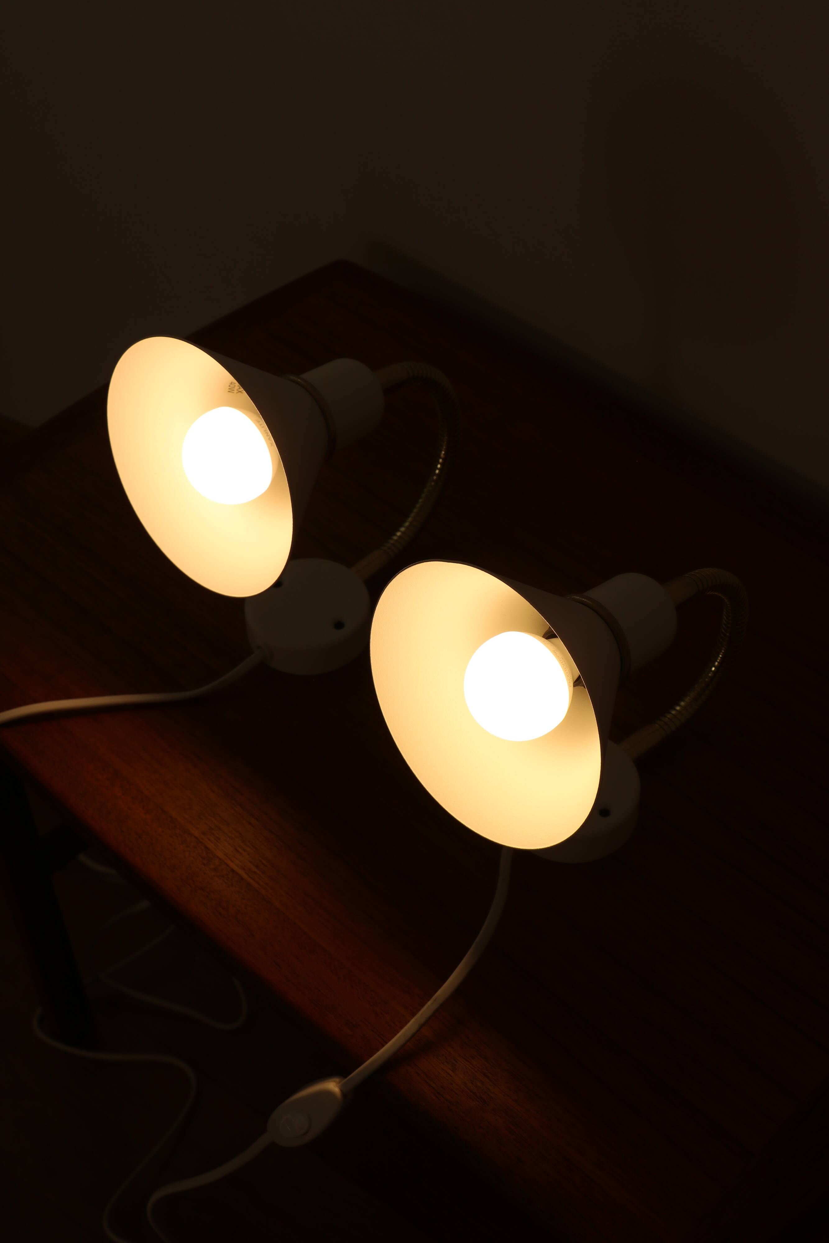 Pair of Scandinavian wall lights in white metal and gold metal